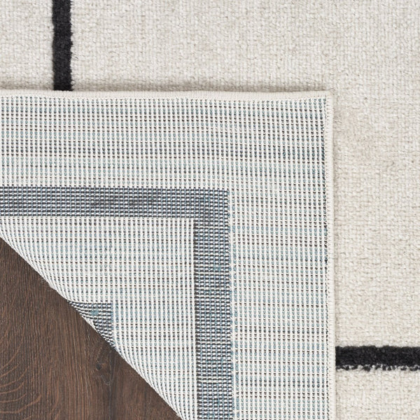 HomeRoots 10' X 14' Ivory and Black Area Rug - Stylish, Durable, and Versatile for Indoor & Outdoor Spaces! 545471