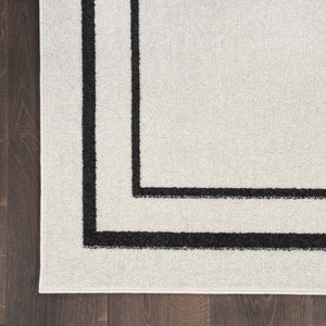 HomeRoots 10' X 14' Ivory and Black Area Rug - Stylish, Durable, and Versatile for Indoor & Outdoor Spaces! 545471