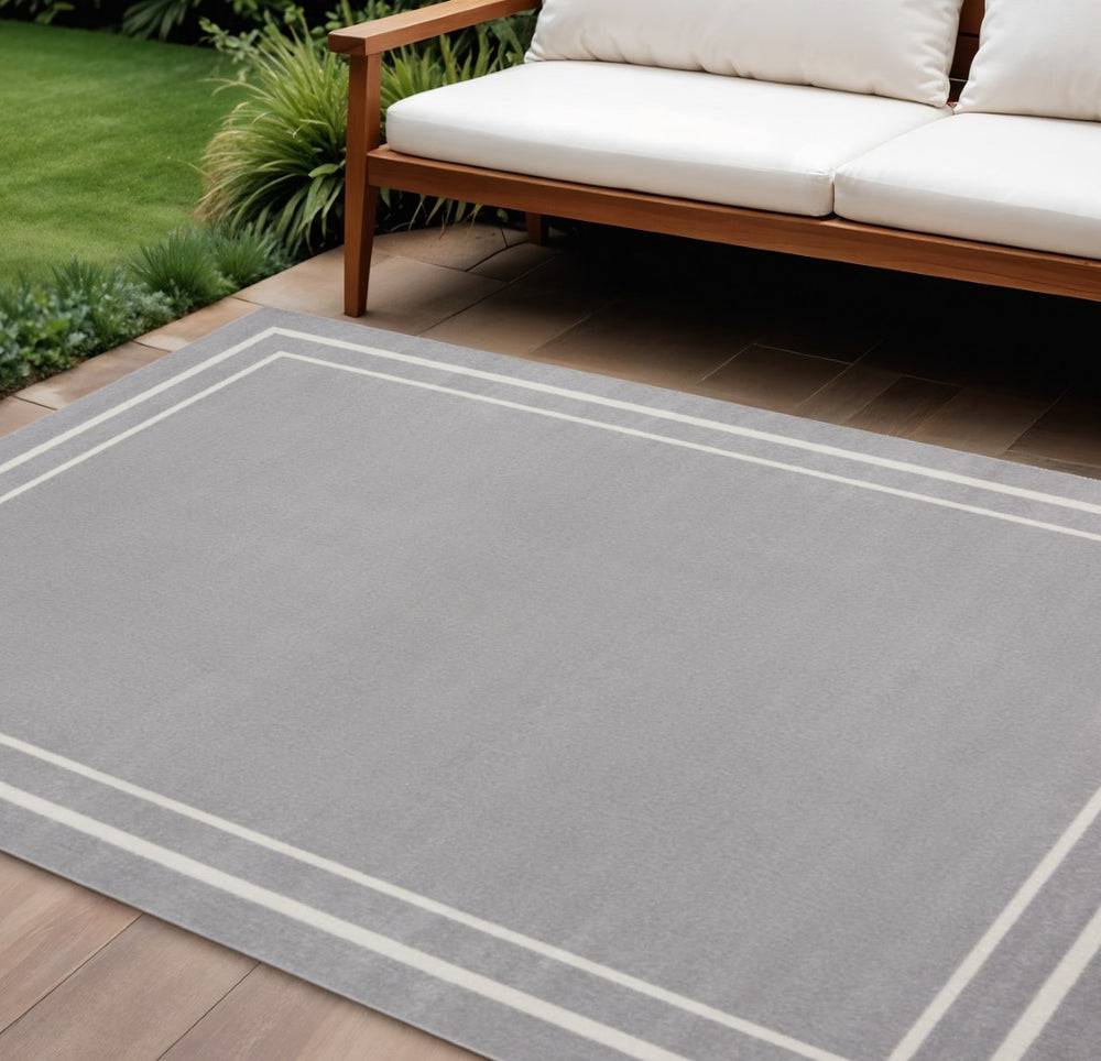 HomeRoots 9' Indoor Outdoor Area Rug in Gray and Ivory - Durable, Weather-Ready Design for Any Space 545478