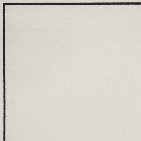 HomeRoots 9' X 12' Ivory and Black Area Rug – Stylish, Durable, Easy-Clean Indoor/Outdoor Decor for Any Space 545479