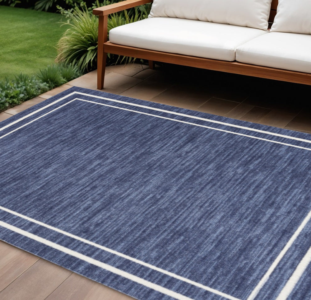 HomeRoots 9' X 12' Navy Blue and Ivory Area Rug - Durable, Stylish Indoor/Outdoor Carpet for Any Space 545480