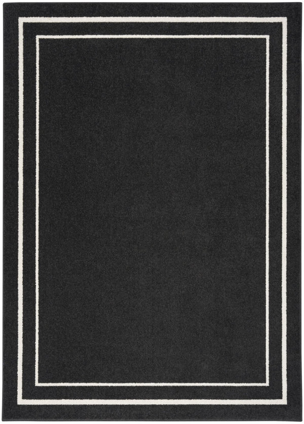 HomeRoots 6' X 9' Black and Ivory Indoor-Outdoor Area Rug - Durable, Stylish, Versatile for Every Space! 545490