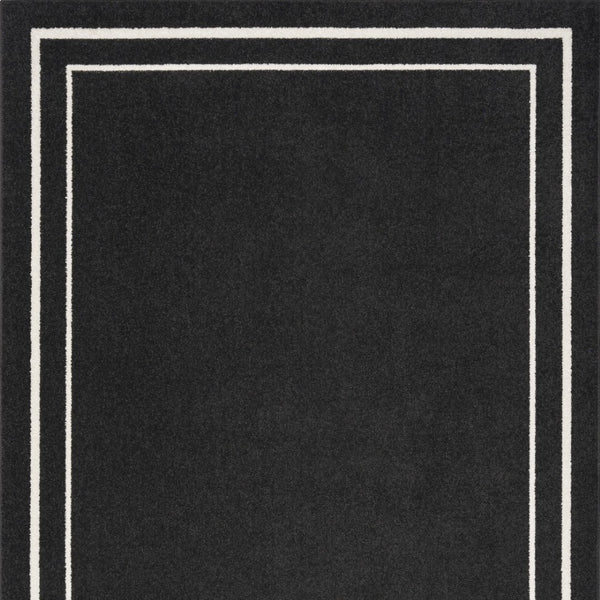 HomeRoots 6' X 9' Black and Ivory Indoor-Outdoor Area Rug - Durable, Stylish, Versatile for Every Space! 545490