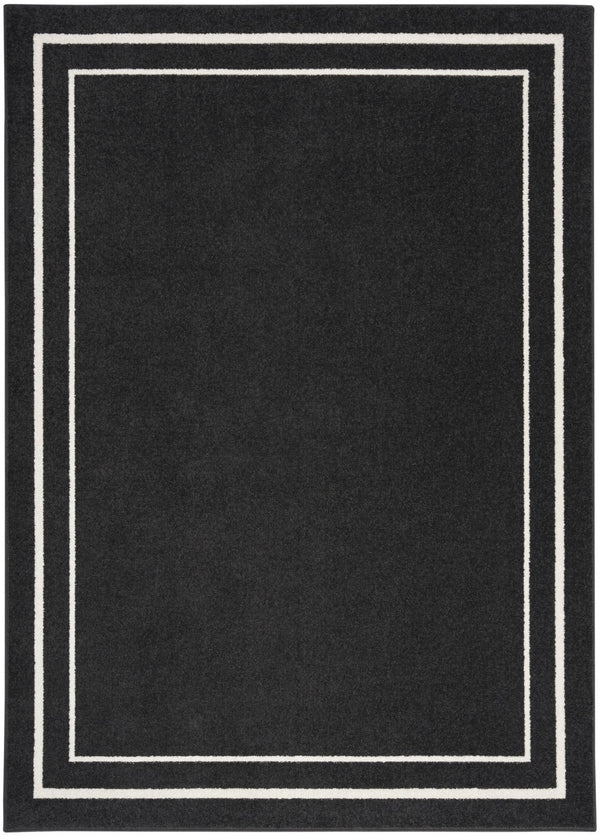 HomeRoots 6' X 9' Black and Ivory Indoor-Outdoor Area Rug - Durable, Stylish, Versatile for Every Space! 545490