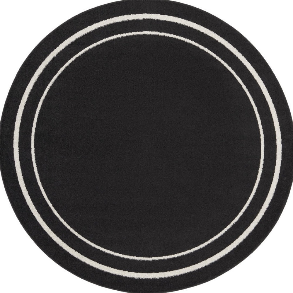 HomeRoots 8' Black And Ivory Round Area Rug - Stylish, Durable, Versatile for Indoor/Outdoor Spaces & High Traffic 545492
