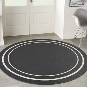 HomeRoots 8' Black And Ivory Round Area Rug - Stylish, Durable, Versatile for Indoor/Outdoor Spaces & High Traffic 545492