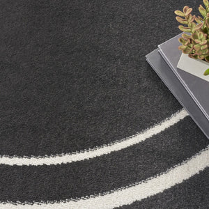 HomeRoots 8' Black And Ivory Round Area Rug - Stylish, Durable, Versatile for Indoor/Outdoor Spaces & High Traffic 545492