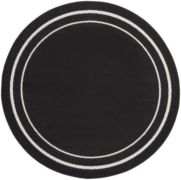 HomeRoots 8' Black And Ivory Round Area Rug - Stylish, Durable, Versatile for Indoor/Outdoor Spaces & High Traffic 545492