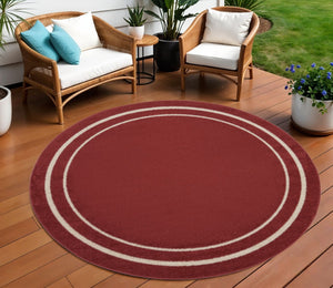 HomeRoots 8' Brick Red and Ivory Round Area Rug - Durable, Geometric Design for Indoor & Outdoor Elegance 545499