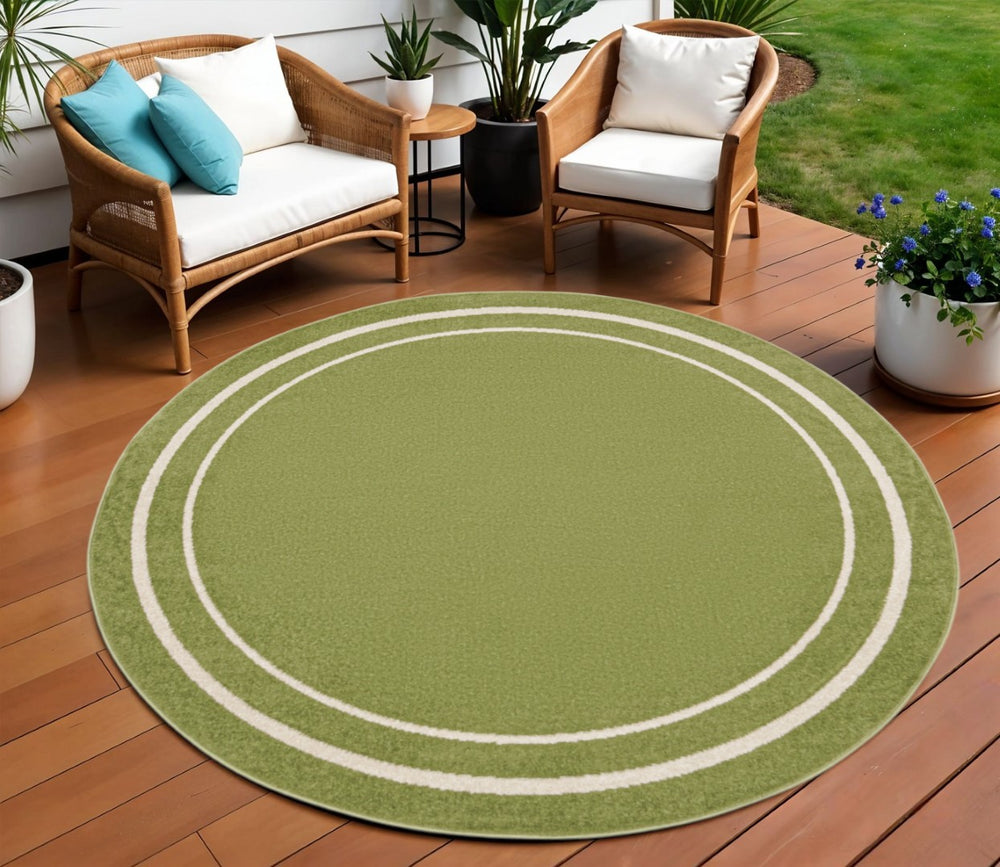 HomeRoots 8' Green and Ivory Round Area Rug – Stylish, Durable, Indoor/Outdoor Design for Versatile Spaces 545513