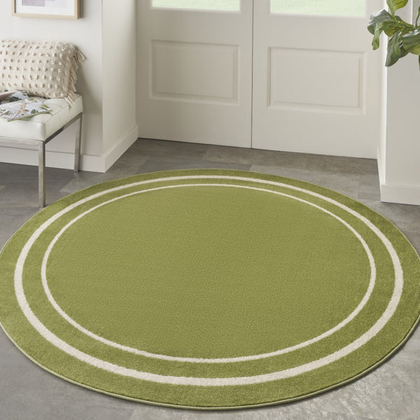 HomeRoots 8' Green and Ivory Round Area Rug – Stylish, Durable, Indoor/Outdoor Design for Versatile Spaces 545513