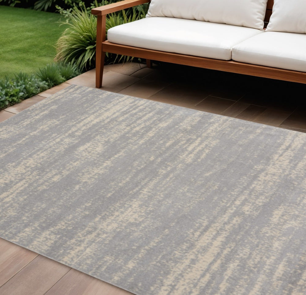 HomeRoots 6' X 9' Gray and Beige Abstract Area Rug - Stylish, Durable Indoor/Outdoor Design for Any Space 545518