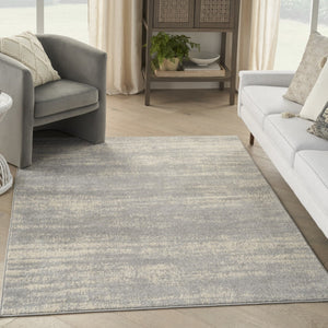 HomeRoots 6' X 9' Gray and Beige Abstract Area Rug - Stylish, Durable Indoor/Outdoor Design for Any Space 545518