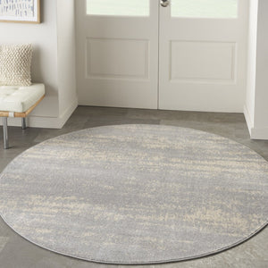 HomeRoots 8' Gray and Beige Round Abstract Area Rug - Stylish, Durable Design for Indoor & Outdoor Spaces 545520