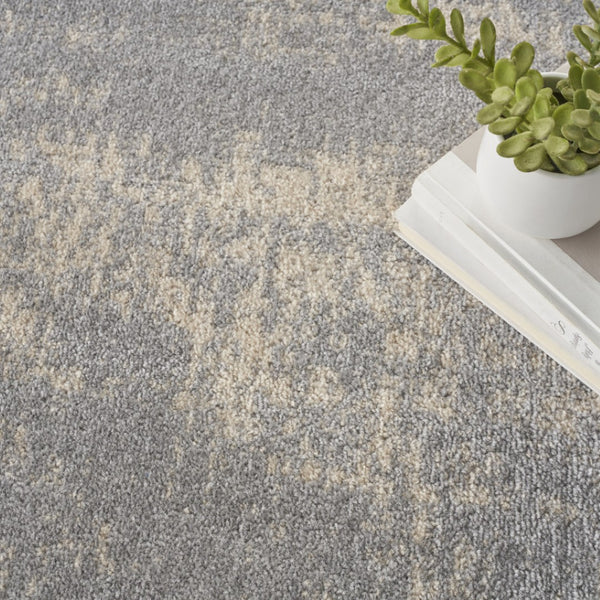 HomeRoots 8' Gray and Beige Round Abstract Area Rug - Stylish, Durable Design for Indoor & Outdoor Spaces 545520