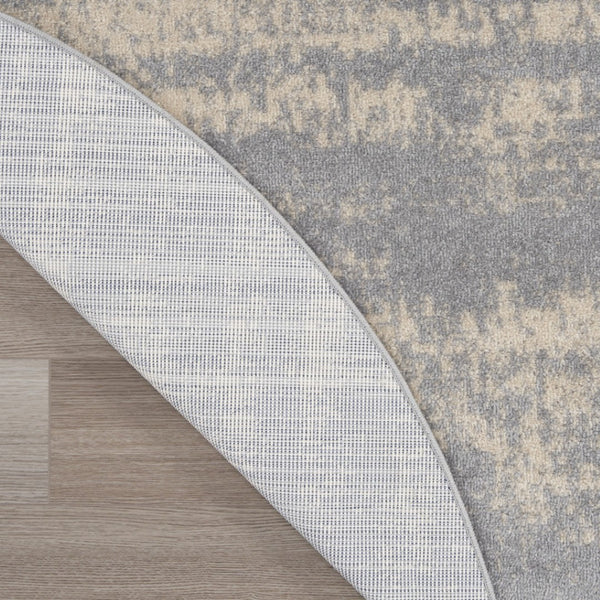 HomeRoots 8' Gray and Beige Round Abstract Area Rug - Stylish, Durable Design for Indoor & Outdoor Spaces 545520
