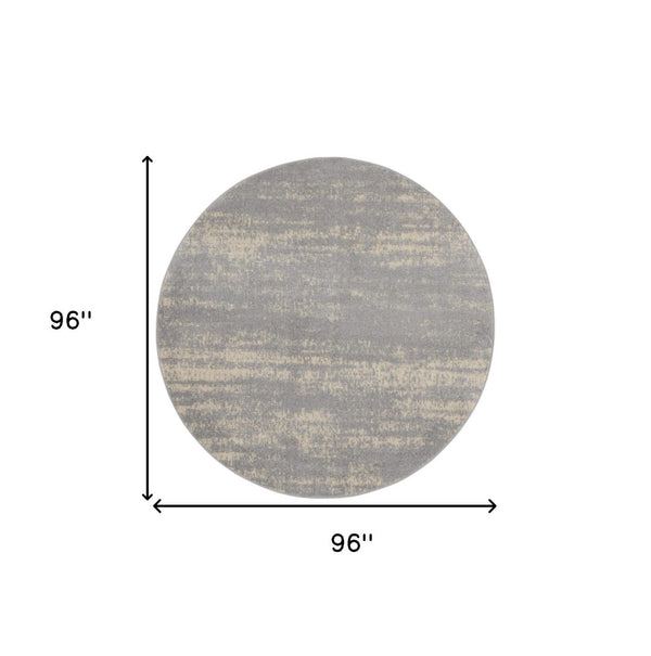 HomeRoots 8' Gray and Beige Round Abstract Area Rug - Stylish, Durable Design for Indoor & Outdoor Spaces 545520