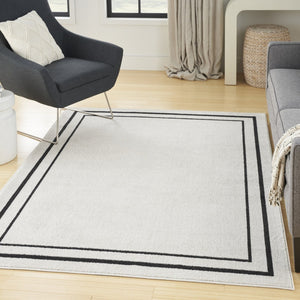 HomeRoots 6' X 9' Ivory and Black Area Rug – Stylish, Durable Indoor/Outdoor Carpet for Any Space, Easy Clean! 545532