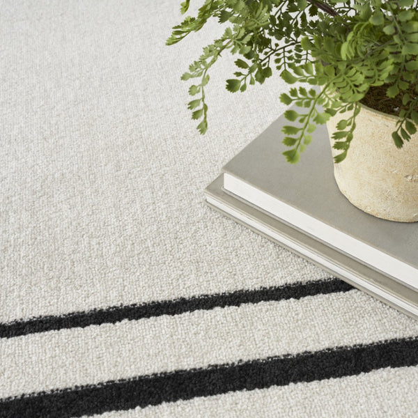 HomeRoots 6' X 9' Ivory and Black Area Rug – Stylish, Durable Indoor/Outdoor Carpet for Any Space, Easy Clean! 545532