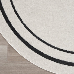 HomeRoots 8' Ivory and Black Round Rug - Weather-Resistant, Stylish Indoor & Outdoor Area Rug for Any Space 545534