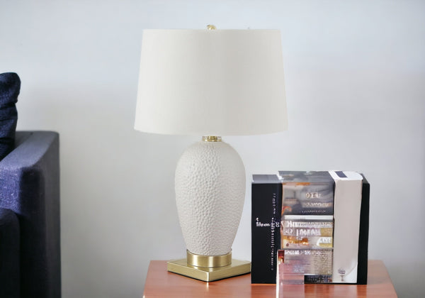 Homeroots 26" Gold And White Ceramic Urn Table Lamp With Cream Empire Shade   545799