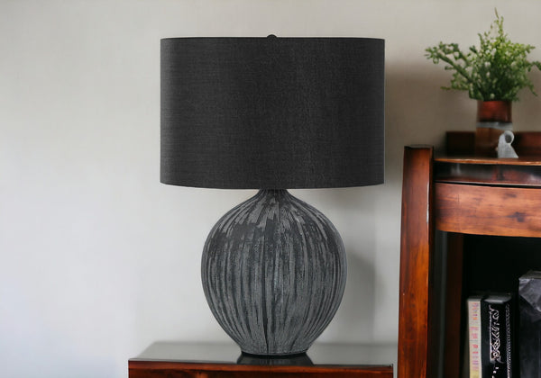 Homeroots 23" Black Ceramic Round Table Lamp With Black Drum Shade   545805