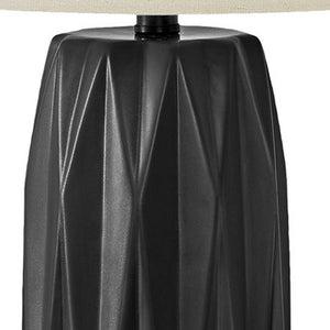 Homeroots 25" Black Ceramic Geometric Table Lamp With Ivory Drum Shade   545807
