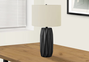 Homeroots 25" Black Ceramic Geometric Table Lamp With Ivory Drum Shade   545807