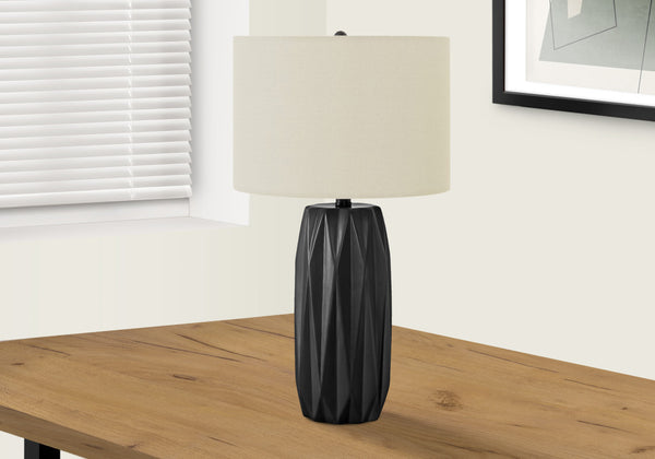 Homeroots 25" Black Ceramic Geometric Table Lamp With Ivory Drum Shade   545807