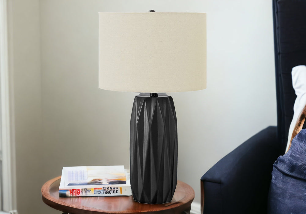 Homeroots 25" Black Ceramic Geometric Table Lamp With Ivory Drum Shade   545807