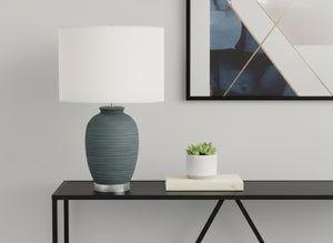 HomeRoots 24" Blue and Silver Ceramic Table Lamp with Ivory Shade - Modern Elegance for Any Room Decor 545809
