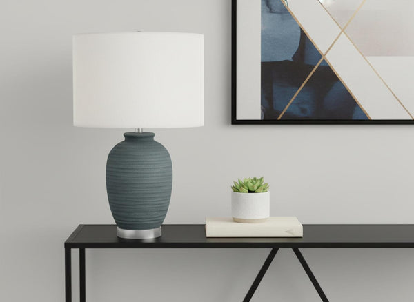 HomeRoots 24" Blue and Silver Ceramic Table Lamp with Ivory Shade - Modern Elegance for Any Room Decor 545809