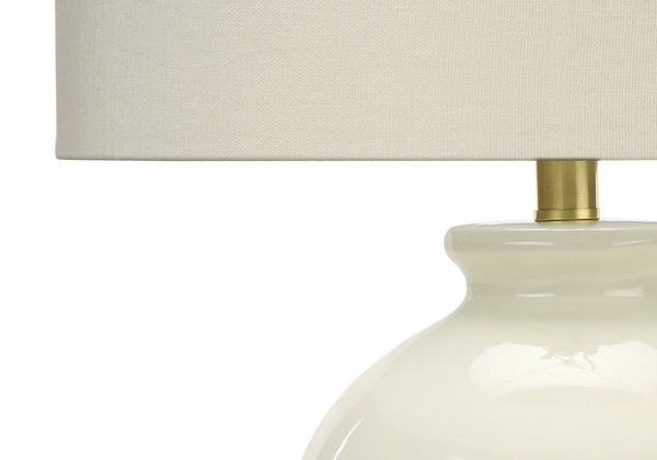 HomeRoots 26" Gold and Ivory Ceramic Urn Table Lamp – Elegant Cream Shade for Ambient Lighting in Any Space 545812