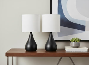 Set of Two Black Metal Round Bedside Lamps Featuring Ivory Drum Shades for Modern Decor