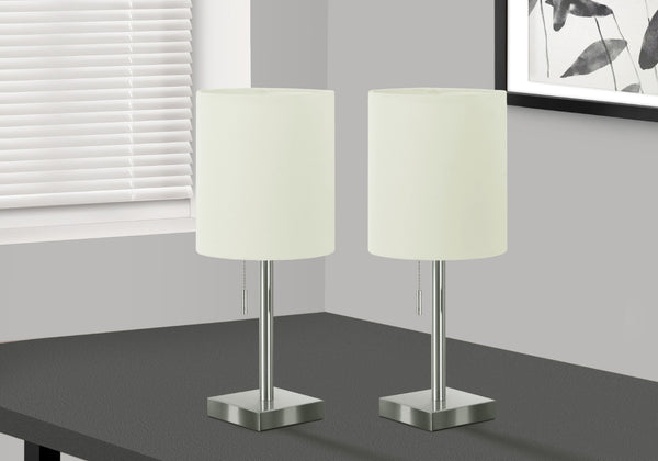 HomeRoots Set of Two 17" Silver Metal Candlestick Table Lamps with USB Charging & Ivory Drum Shades 545831