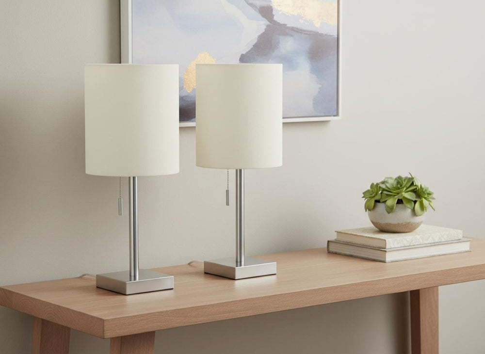 HomeRoots Set of Two 17" Silver Metal Candlestick Table Lamps with USB Charging & Ivory Drum Shades 545831
