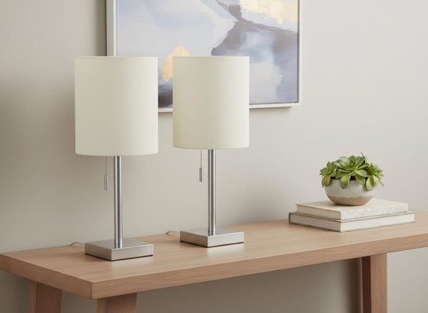 HomeRoots Set of Two 17" Silver Metal Candlestick Table Lamps with USB Charging & Ivory Drum Shades 545831