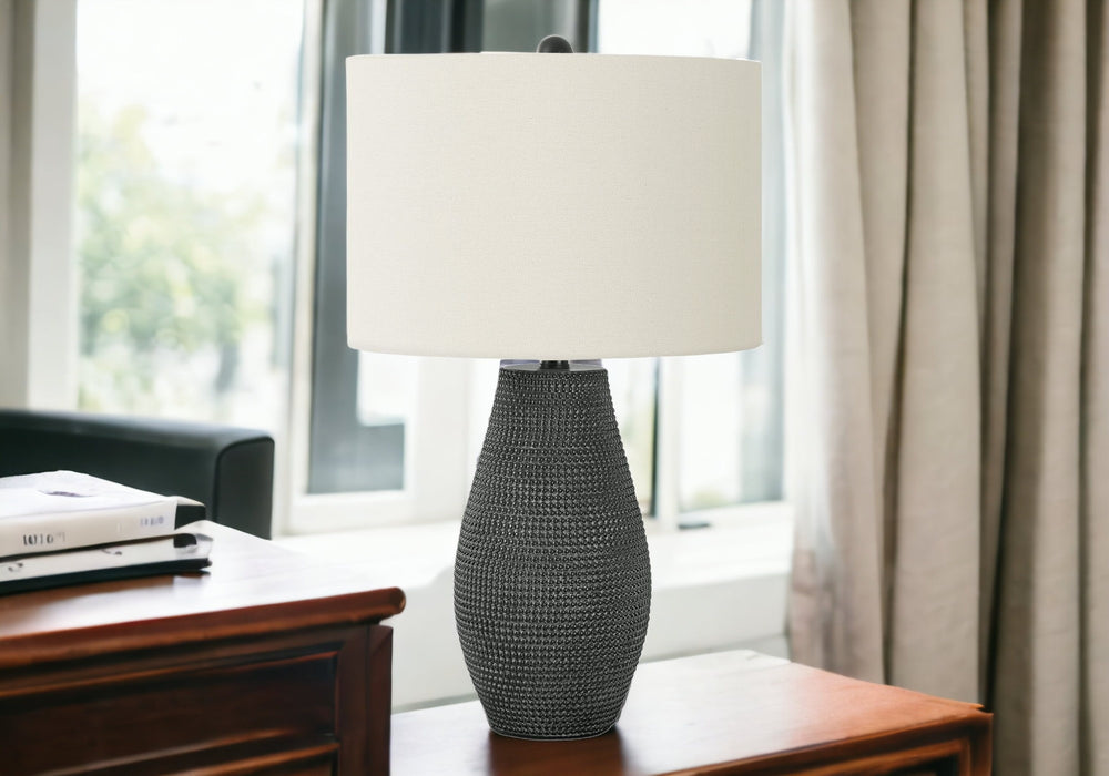 Homeroots 24" Black Round Table Lamp With Ivory Drum Shade   545835