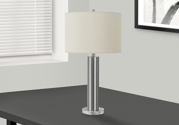 HomeRoots 28" Silver Acrylic Cylinder Table Lamp with Ivory Shade - Modern Illumination for Any Space 545836