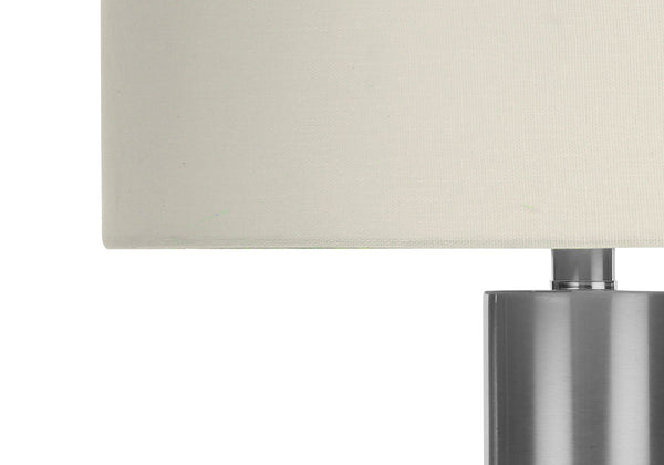 HomeRoots 28" Silver Acrylic Cylinder Table Lamp with Ivory Shade - Modern Illumination for Any Space 545836
