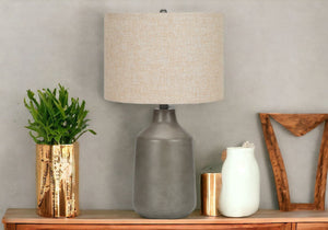 Homeroots 24" Gray Concrete Urn Table Lamp With Beige Drum Shade   545841