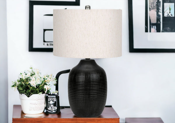 Homeroots 26" Black Ceramic Urn Table Lamp With Ivory Drum Shade   545843