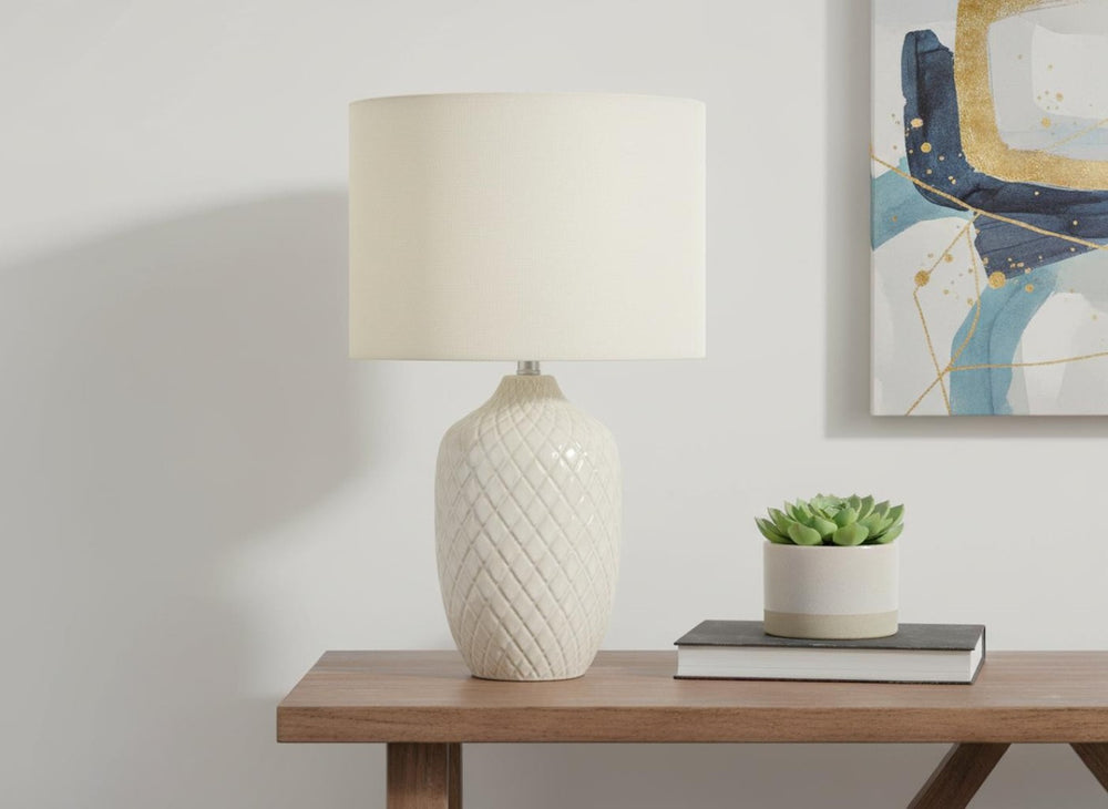 HomeRoots 25" Cream Ceramic Urn Table Lamp - Elegant Geometric Design with Soft Glow for Modern Spaces 545845