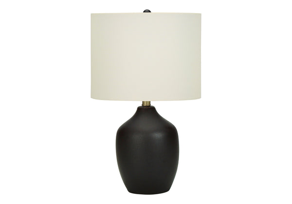 Homeroots 22" Black Ceramic Urn Table Lamp With Ivory Drum Shade   545846