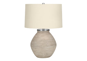 Homeroots 25" Cream Concrete Round Table Lamp With Beige Drum Shade   545852
