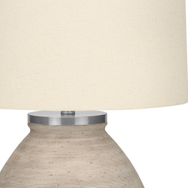 Homeroots 25" Cream Concrete Round Table Lamp With Beige Drum Shade   545852