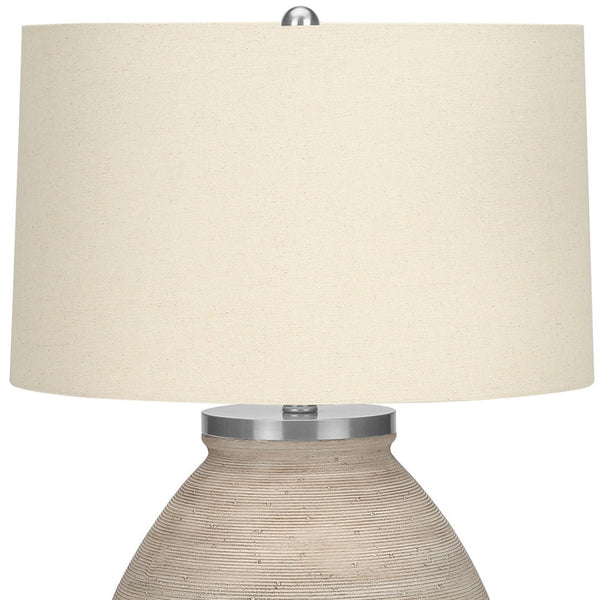 Homeroots 25" Cream Concrete Round Table Lamp With Beige Drum Shade   545852