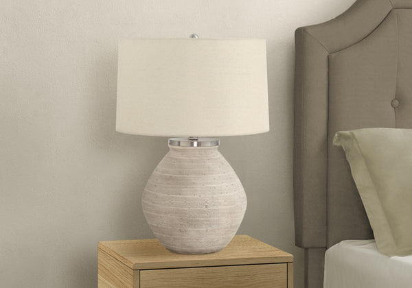 Homeroots 25" Cream Concrete Round Table Lamp With Beige Drum Shade   545852
