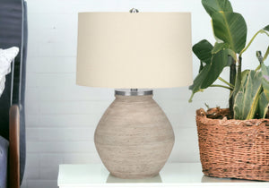 Homeroots 25" Cream Concrete Round Table Lamp With Beige Drum Shade   545852