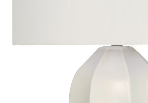 HomeRoots 27" Cream Ceramic Geometric Table Lamp – Elegant Design with Soft Lighting for Any Room's Ambiance 545869